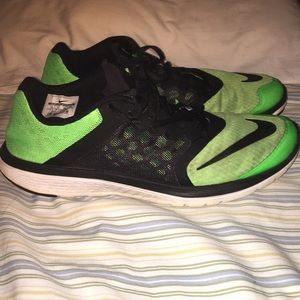Nike running green and black size 12
